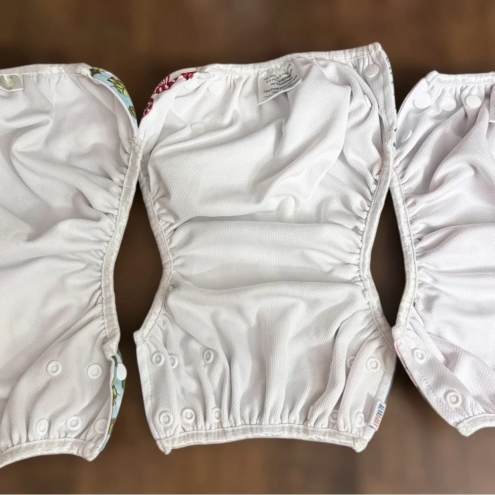 Cloth diaper covers or reusable swim diapers. Set of 3 to Grow with Baby